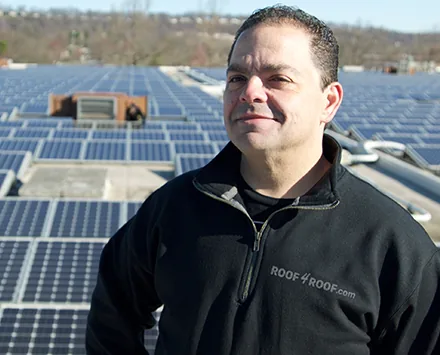 Chuck Anania of Roof4Roof at a completed solar roofing project